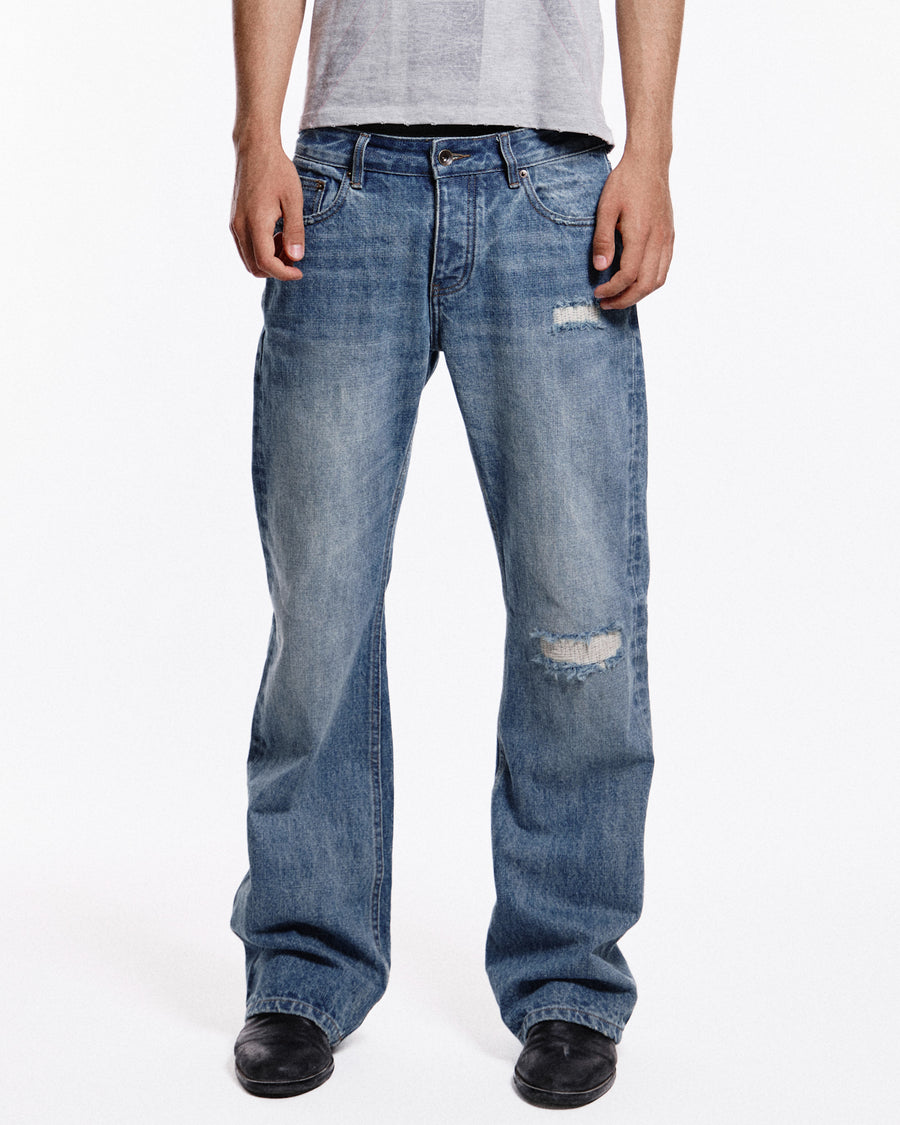 'Repaired' Washed blue jeans