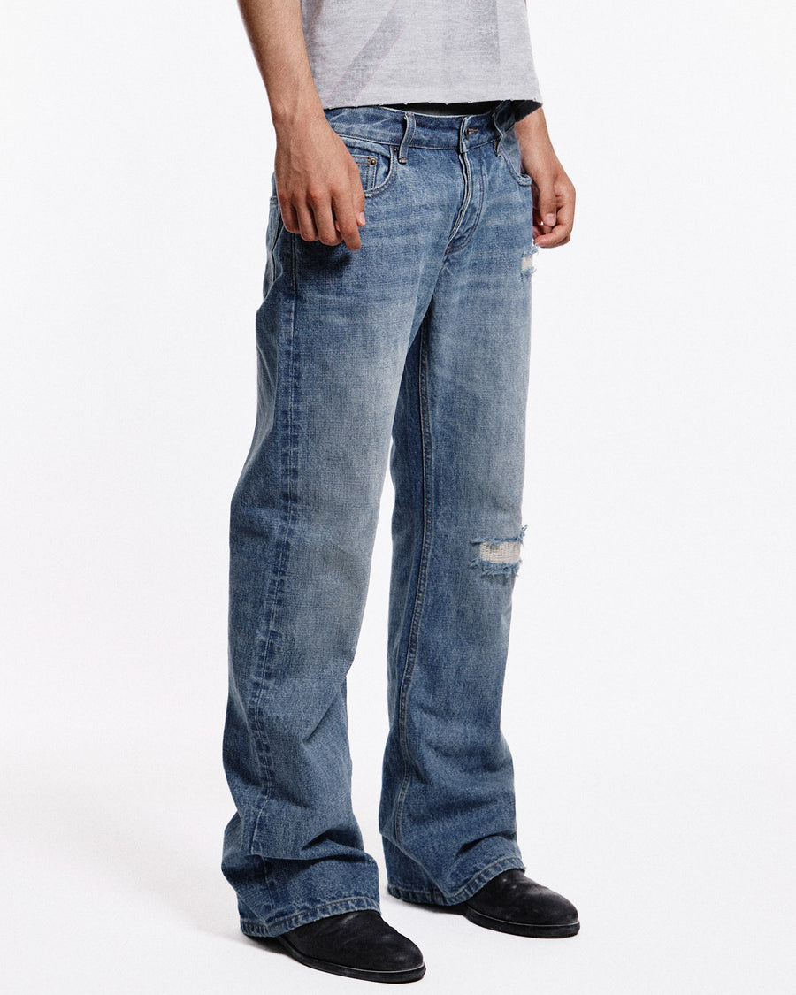 'Repaired' Washed blue jeans