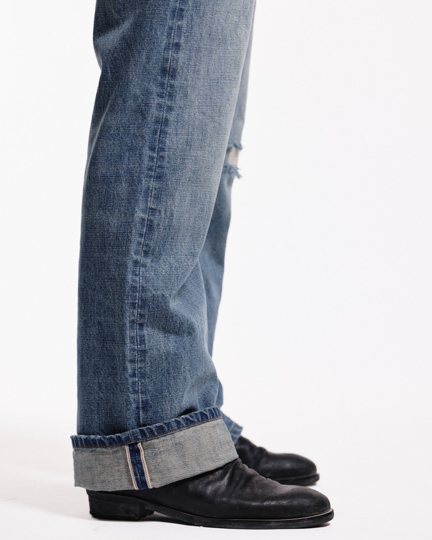 'Repaired' Washed blue jeans