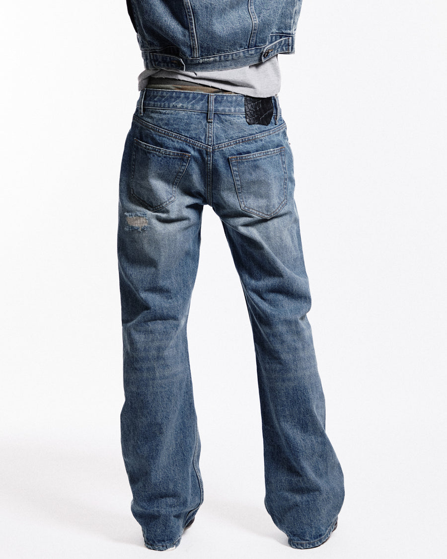 'Repaired' Washed blue jeans