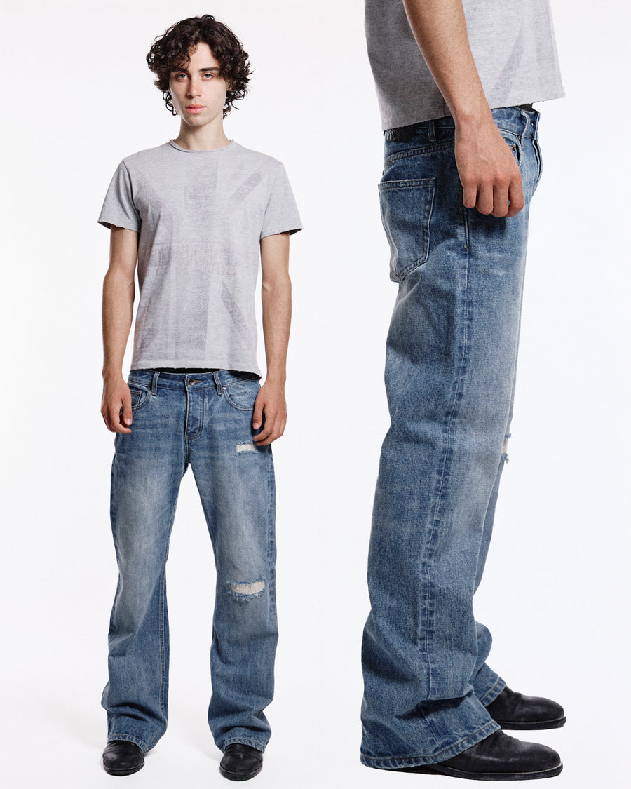 'Repaired' Washed blue jeans