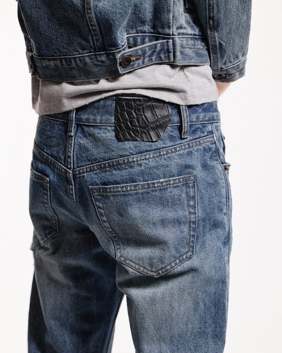 'Repaired' Washed blue jeans