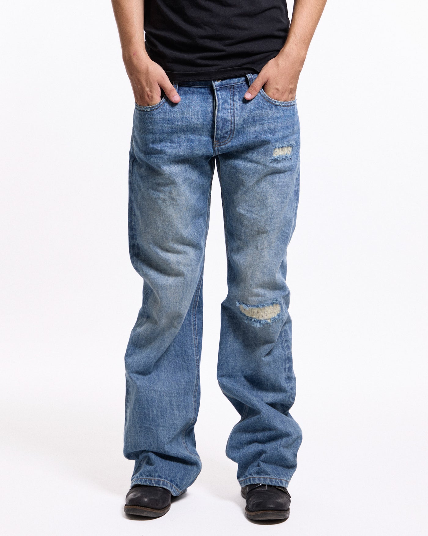 'Repaired' Washed blue jeans