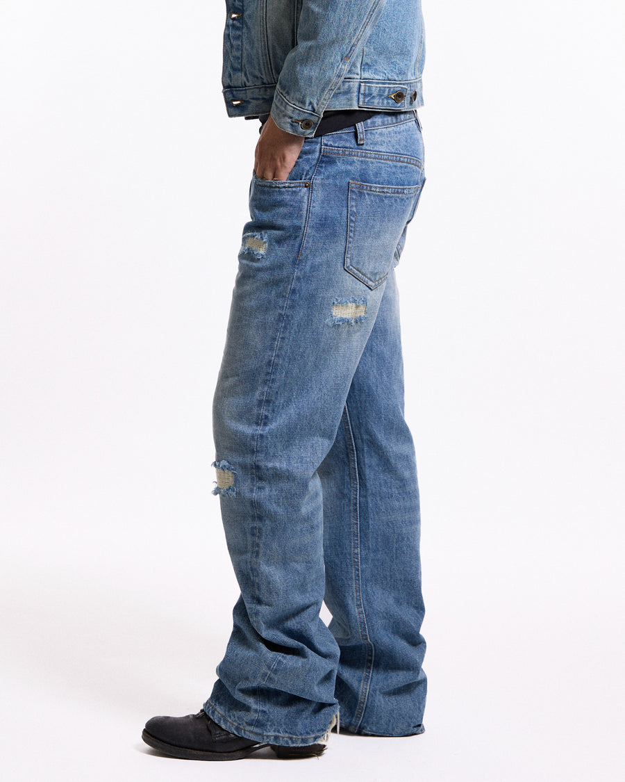 'Repaired' Washed blue jeans
