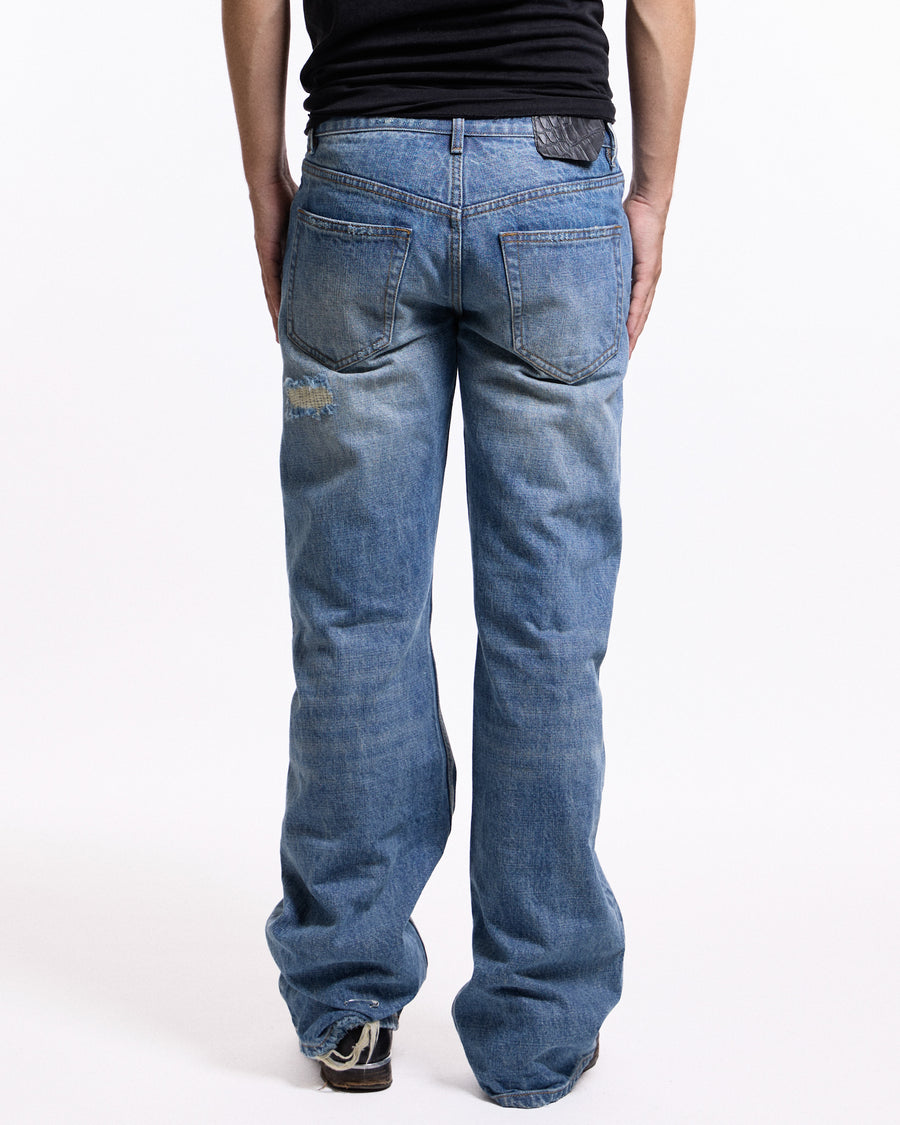 'Repaired' Washed blue jeans