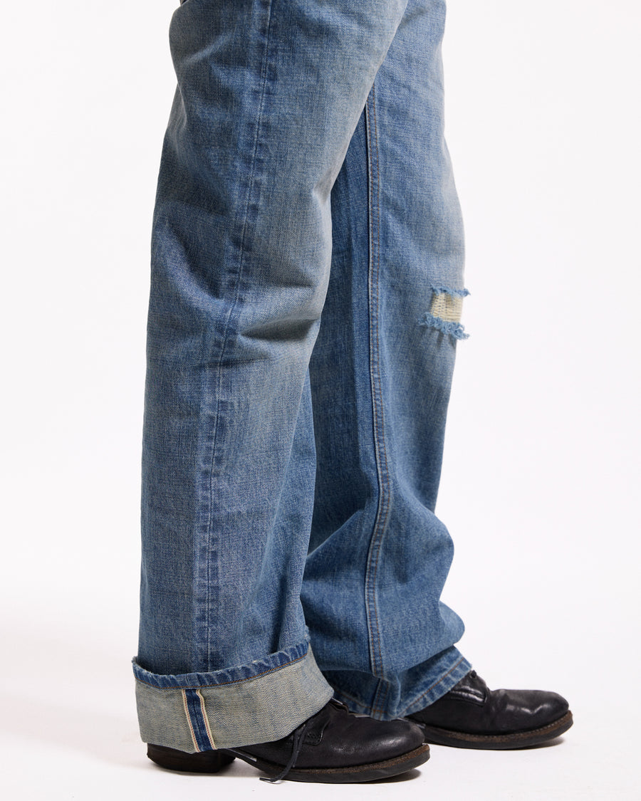 'Repaired' Washed blue jeans